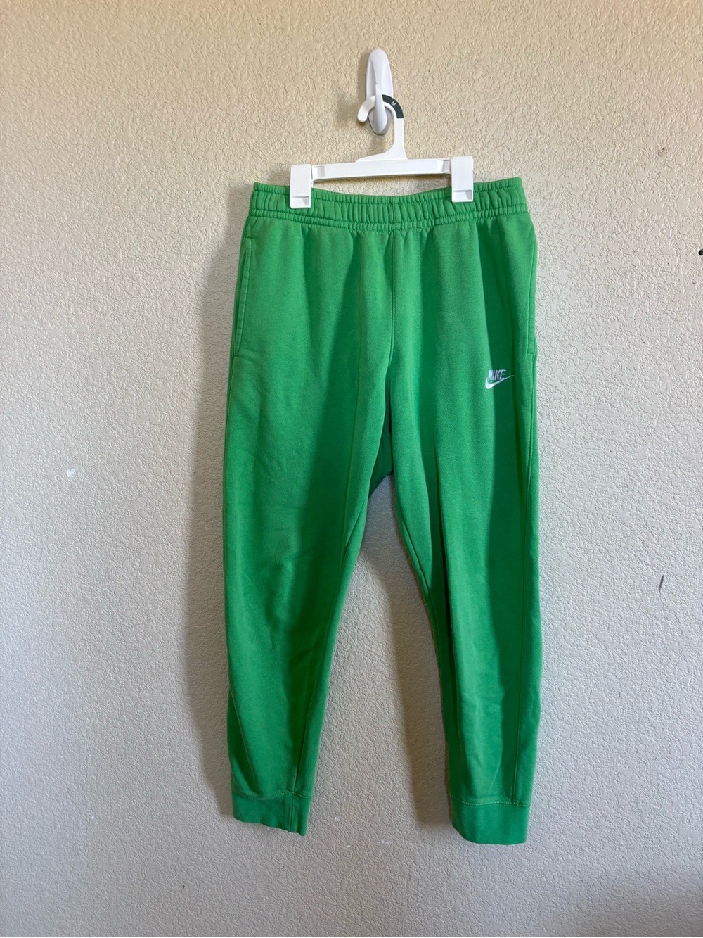 Green Nike sweatpants